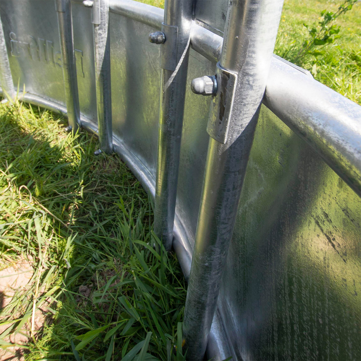 Feeder with covered tombstone rails, 12 openings