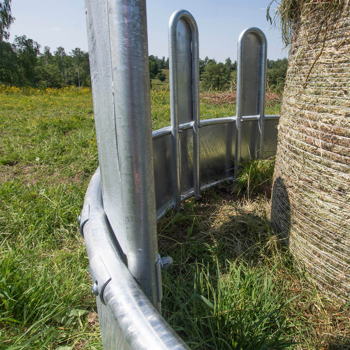 Feeder with covered tombstone rails, 12 openings